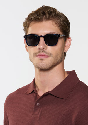 PARKER | Indigo Tortoise Handcrafted, luxury dark blue tortoise acetate square wayfarer KREWE sunglasses mens model | Model: Linus