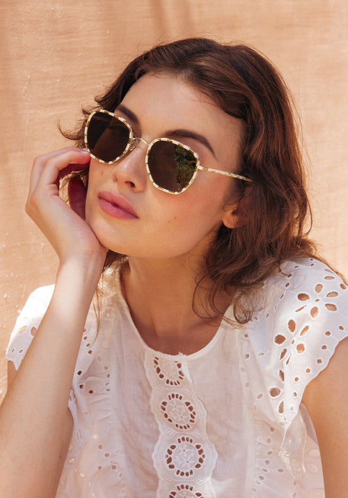 PASCAL | 12K Titanium + Oki Yuzu Handcrafted, luxury yellow green checkered acetate and titanium round geometric KREWE sunglasses womens model campaign | Model: Kennidy