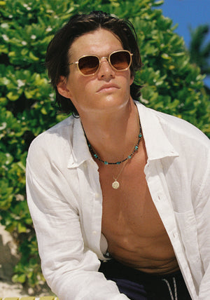 PEYTON | 12K Titanium + Champagne and Iberia Handcrafted, luxury champagne yellow acetate and titanium geometric KREWE sunglasses mens model | Model: Drew