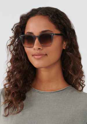 PRYTANIA | Oolong Handcrafted, luxury translucent grey blue amber gradient acetate KREWE sunglasses womens model | Model: Meli
