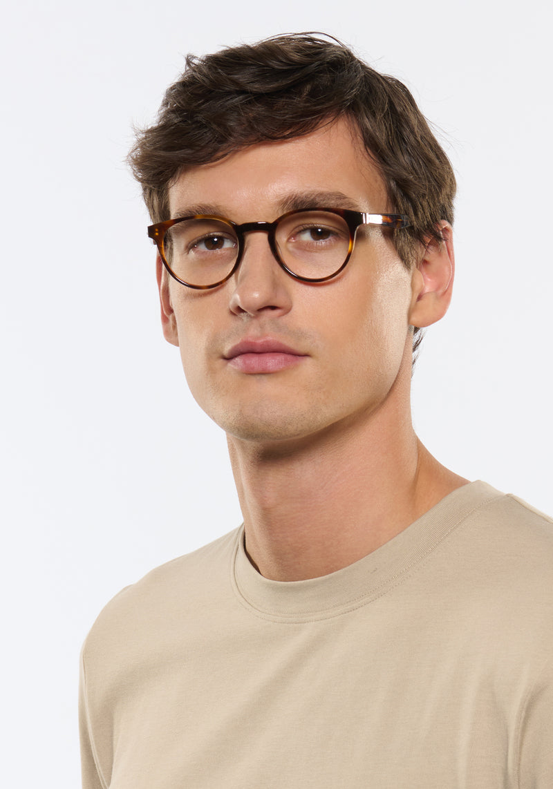 QUINN | Havana Handcrafted, luxury brown tortoise acetate round KREWE eyeglasses mens model | Model: Jegor