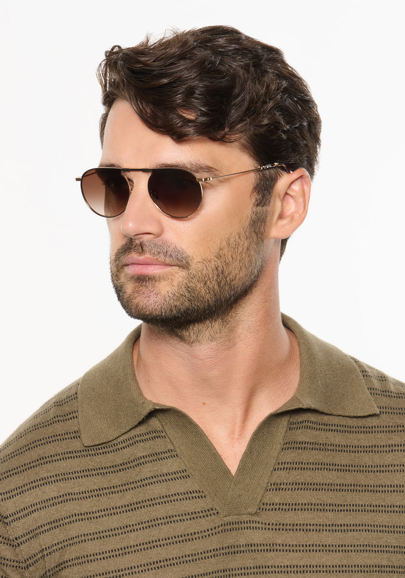 RAMPART FOLD | 18K + Matte Black Fade + Poppy Noir Handcrafted, luxury stainless steel round folding aviator KREWE sunglasses mens model | Model: Ryan A.