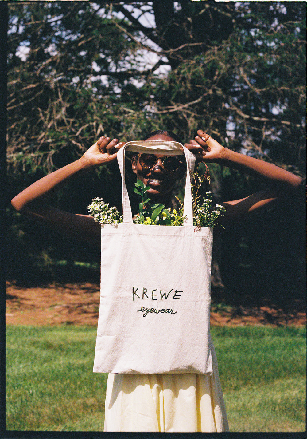 Tote bag with colorful floral pattern on a white background
womens model