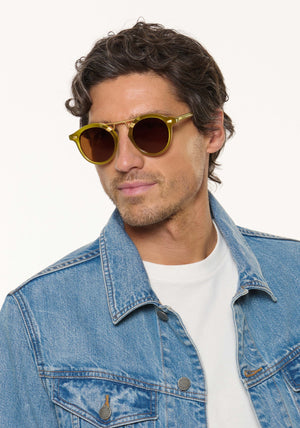 STL II | Cactus 18K Handcrafted, large round luxury lime green acetate and 18K gold metal bridge KREWE sunglasses mens model | Model: Ryan