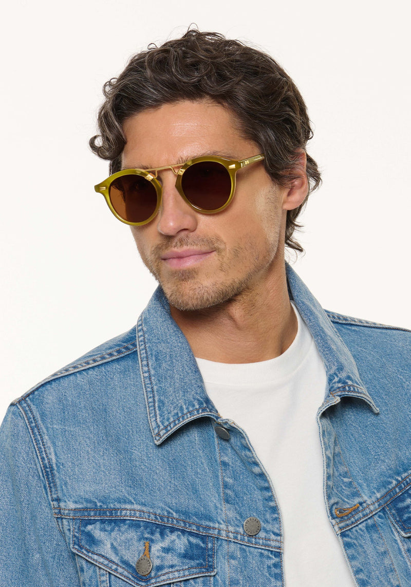 STL II | Cactus 18K Handcrafted, large round luxury lime green acetate and 18K gold metal bridge KREWE sunglasses mens model | Model: Ryan