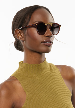 STL II | Espresso 18K Handcrafted, large round luxury dark brown acetate and 18K gold metal bridge KREWE sunglasses womens model | Model: Brenda