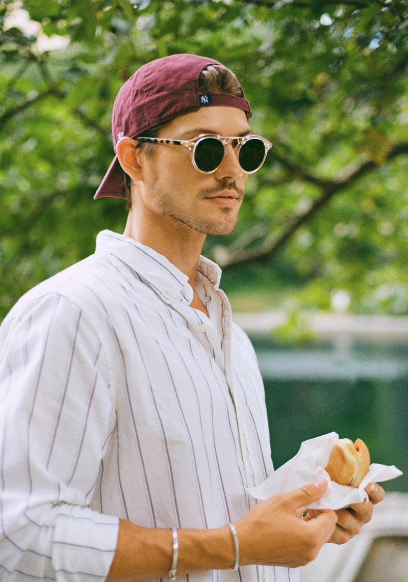 STL II | Haze + Iberia 12K Polarized Handcrafted, large round luxury champagne pearlescent acetate and 12K gold metal bridge KREWE sunglasses mens model | Model: Linus