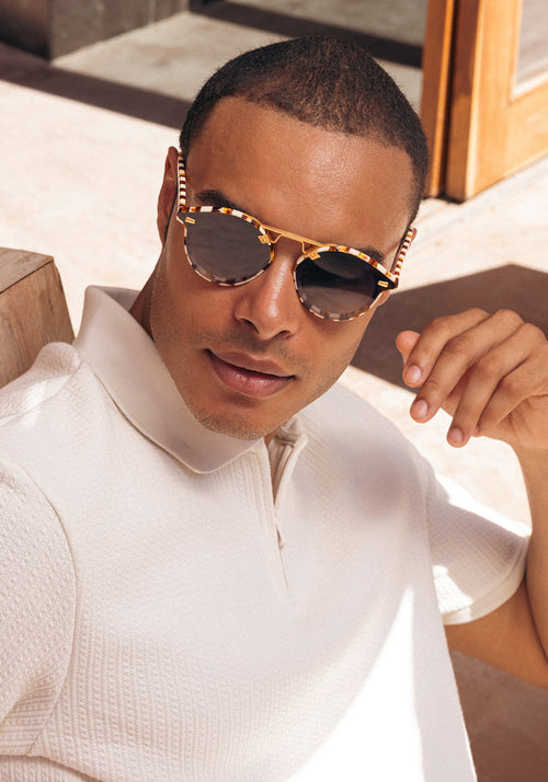 STL NYLON | Caffe 24K Handcrafted, luxury brown checkered acetate round KREWE sunglasses with flat edge to edge nylon lens mens model campaign | Model: Jeffrey