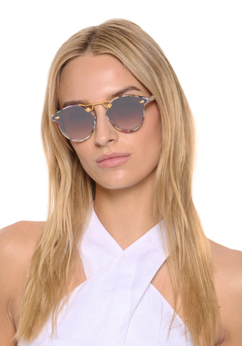 STL NYLON | Gelato 24K Mirrored Handcrafted, luxury multicolored acetate round KREWE sunglasses with flat edge to edge nylon lens and 24k gold metal women's model | Model: Isabelle