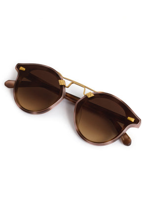 STL NYLON | Matte Blush Tort 18K Handcrafted, luxury pink and brown tortoise acetate round KREWE sunglasses with flat edge to edge nylon lens and 18k gold metal bridge