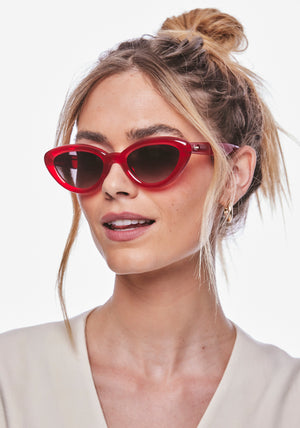 SASHA | Cherry Handcrafted, luxury glossy red acetate bubble cat-eye KREWE sunglasses womens model | Model: Meghan