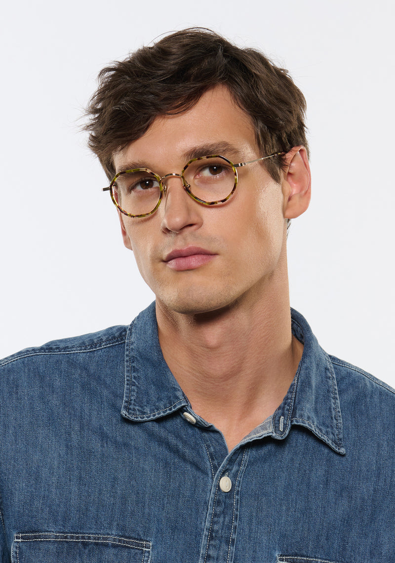 SIMON | 12K Titanium + Lynx Handcrafted neutral brown green round geometric titanium and acetate KREWE eyeglasses mens model | Model: Jegor