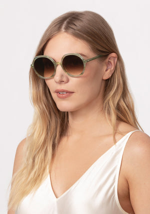 SOPHIA | Selene Handcrafted, luxury light green acetate oversized round geometric KREWE sunglasses womens model | Model: Maritza