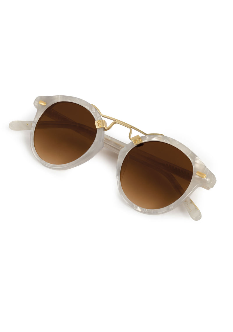 ST. LOUIS | Alabaster 18K Handcrafted, luxury light grey acetate round KREWE sunglasses with gold bridge and hardware