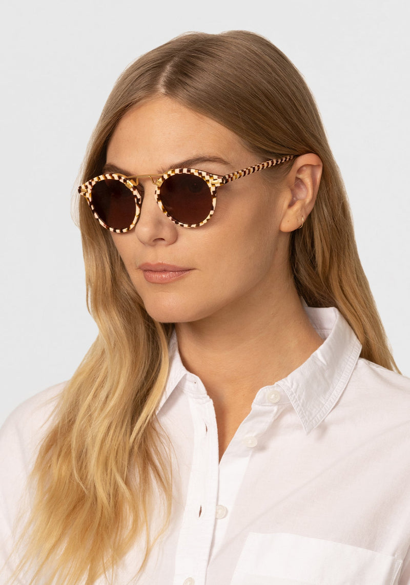 KREWE ST. LOUIS CLASSICS | Caffe Dolce 24K Handcrafted, luxury, checkered acetate KREWE sunglasses womens model | Model: Maritza
