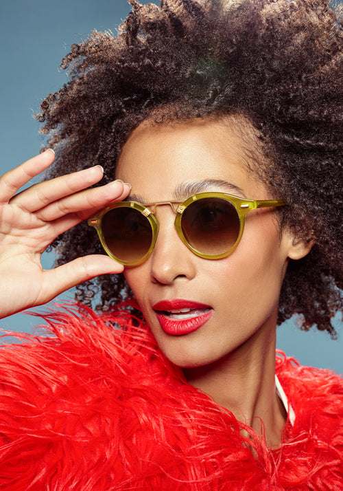ST. LOUIS | Chartreuse 18K Handcrafted, luxury, yellow green acetate round KREWE sunglasses with gold bridge and hardware womens model campaign | Model: Melie