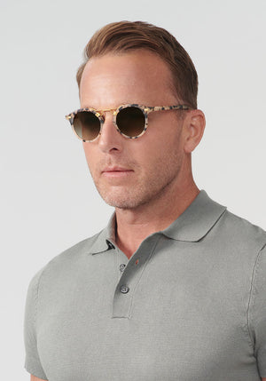 ST. LOUIS | Matte Oyster 24K handcrafted, luxury, cream tortoise, acetate KREWE sunglasses mens model | Model: Tim