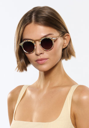 ST. LOUIS | Pink Poppy 18K Polarized Handcrafted, luxury, light pink speckled multicolored acetate round KREWE sunglasses with gold bridge and hardware womens model | Model: Michelle