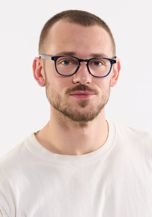 KREWE - STATE | Midnight handcrafted, luxury blue acetate sunglasses mens model | Model: Connor