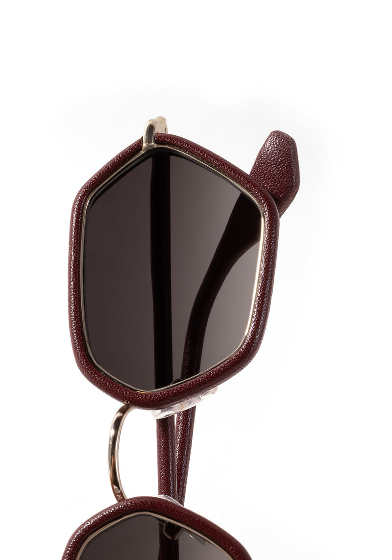 SUKIE | 12K + Burgundy Leather Handcrafted, luxury burgundy leather and stainless steel small geometric KREWE sunglasses womens model