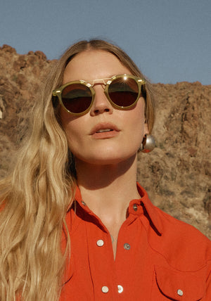 STL II | Cactus 18K Handcrafted, large round luxury lime green acetate and 18K gold metal bridge KREWE sunglasses womens model | Model: Tova