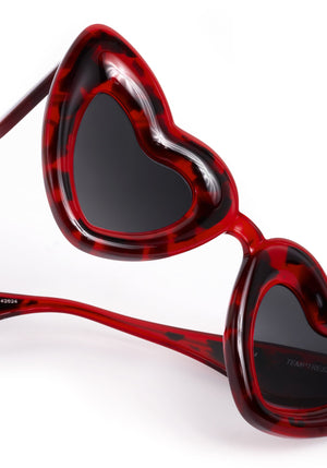 TEMPTRESS | Dirty Shirley Handcrafted, luxury red tortoise acetate oversized heart shaped Mardi Gras KREWE sunglasses