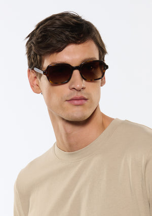 TOMMIE | Havana Polarized Handcrafted, dark brown tortoise acetate square rectangle polarized KREWE sunglasses mens model | Model: Jegor