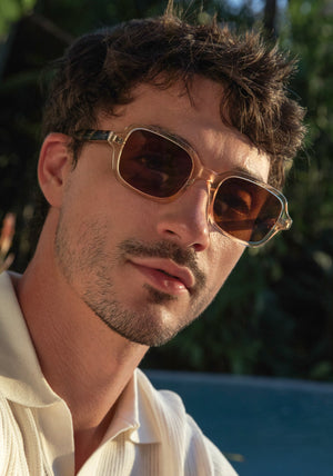 TOMMIE | Haze + Iberia Handcrafted, champagne pearlescent acetate square rectangle KREWE sunglasses mens model | Model: Jacob
