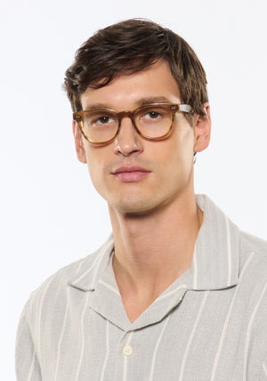 Tucker | Umber Handcrafted brown acetate square KREWE eyeglasses mens model | Model: Jegor