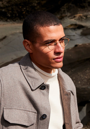 VIRGIL | 18K Matte Black Fade Titanium Handcrafted, luxury 18K black gold metal round KREWE eyeglasses mens model | Model: Vincent