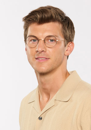 VIRGIL | 18K Matte Black Fade Titanium Handcrafted, luxury 18K black gold metal round KREWE eyeglasses mens model | Model: Ben