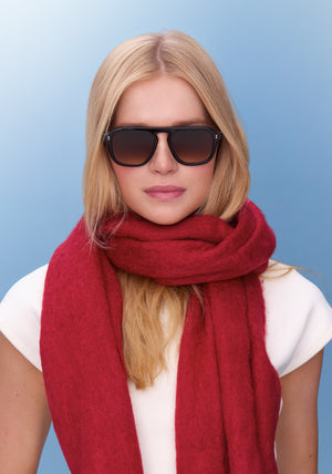 ZANDER | Black + Black Tea Handcrafted, luxury black acetate large rectangular aviator KREWE sunglasses womens model | Model: Emily U.