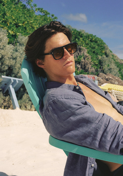 ZANDER | Black + Black Tea Handcrafted, luxury black acetate large rectangular aviator KREWE sunglasses mens model | Model: Drew