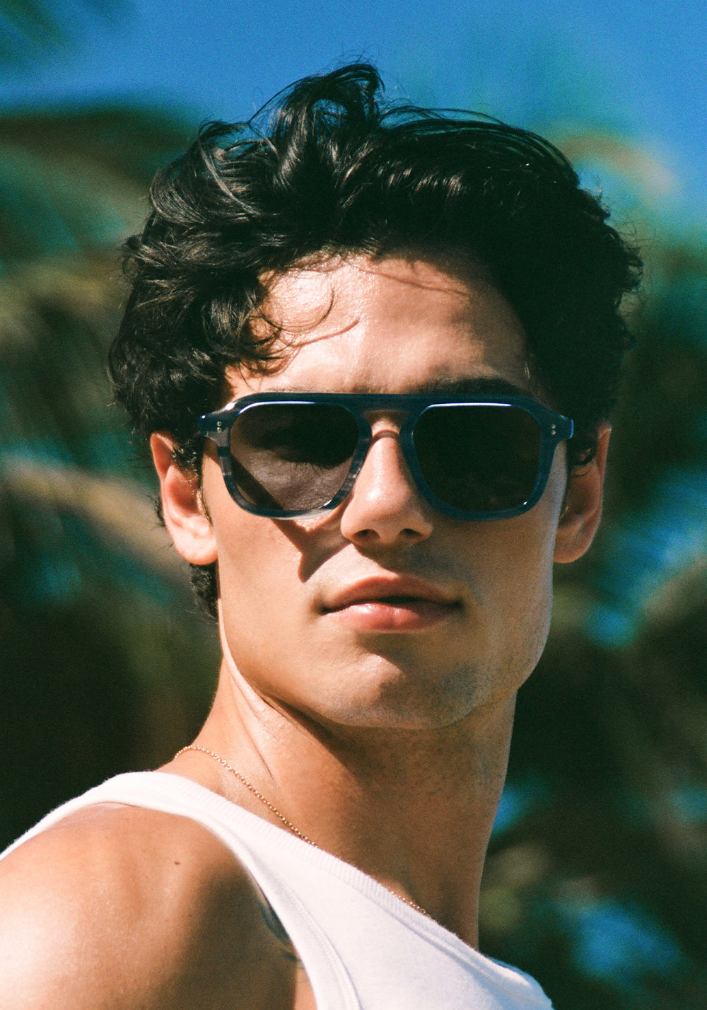 ZANDER | Ripple Handcrafted, luxury dark blue tortoise acetate large rectangular aviator KREWE sunglasses campaign mens model | Model: Hayden