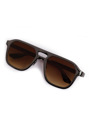 ZANDER CHROMA | Gunmetal Chroma + Black Tea Handcrafted, luxury dark brown polished chrome stainless steel large square aviator KREWE sunglasses