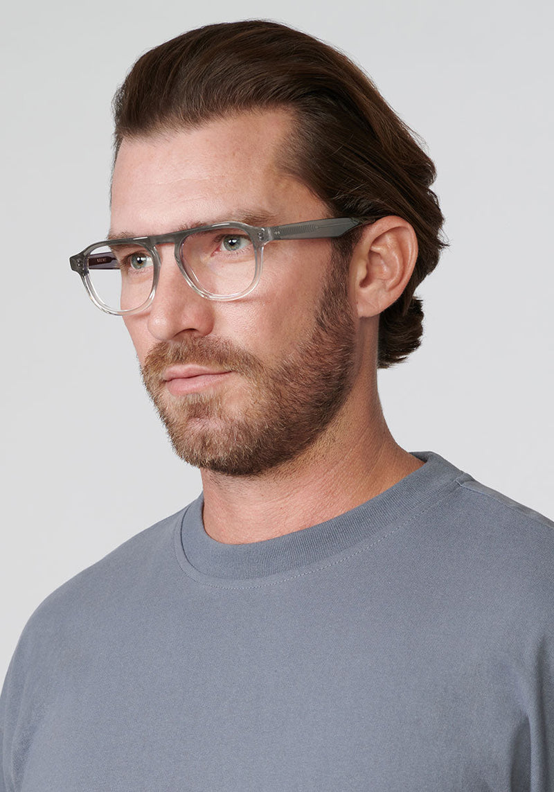 CALVIN | Steam Handcrafted, luxury grey acetate KREWE glasses mens model | Model: Zach