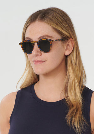 COLLINS | Topaz Handcrafted, luxury blue tortoise acetate KREWE sunglasses womens model | Model: Brooke