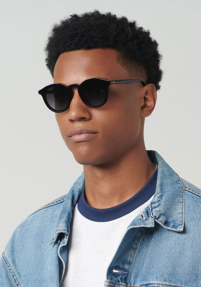 COLLINS NYLON | Black + Black and Crystal handcrafted, luxury black acetate KREWE round sunglasses mens model | Model: Brandon