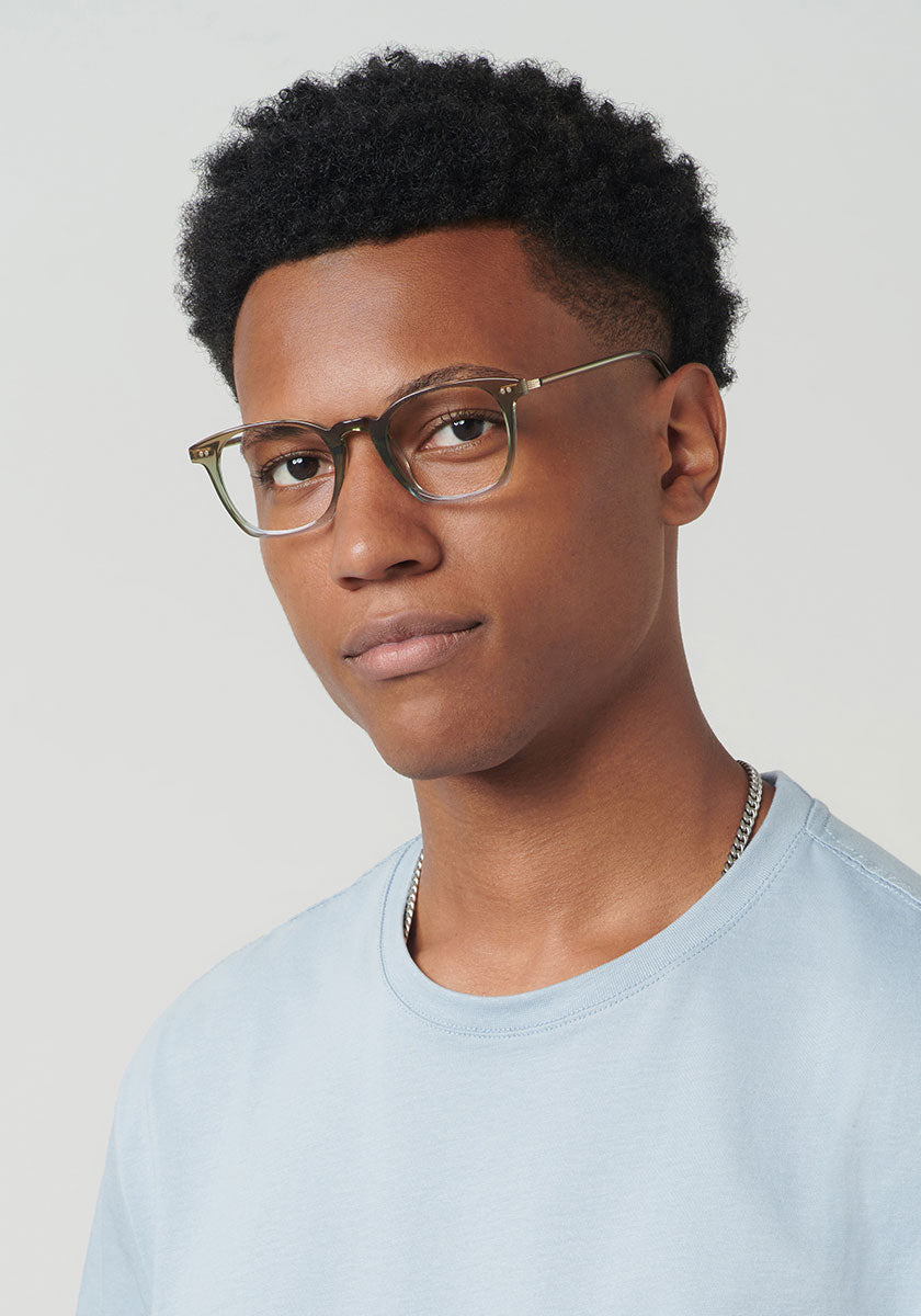 DESOTO | Matcha 12K Handcrafted, luxury blue and green acetate KREWE glasses mens model | Model: Brandon