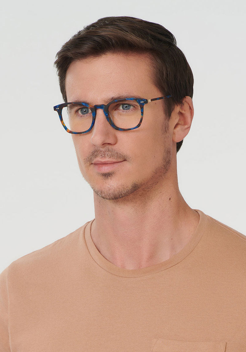 KREWE DESOTO | Matte Blue Steel Handcrafted, Luxury Blue Tortoise acetate eyeglasses mens model | Model: Tom