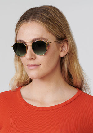 EARHART BLINKER | 24K + Capri Handcrafted, luxury titanium KREWE sunglasses with multicolor blinkers womens model | Model: Brooke