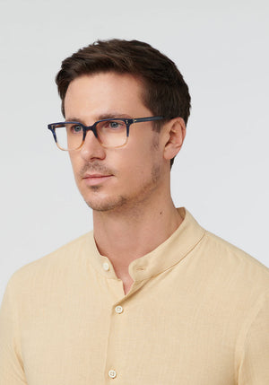 KREWE - HUDSON | Comet + Twilight Handcrafted, luxury yellow and navy split acetate eyeglasses mens model | Model: Tom