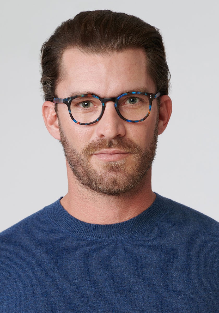 KREWE - MARENGO | Matte Blue Steel Handcrafted, Luxury Blue Tortoise Shell Acetate Eyeglasses mens model | Model: Zach