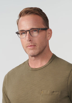 KREWE - MERCER | Birch Handcrafted, luxury grey acetate glasses mens model | Model: Tim