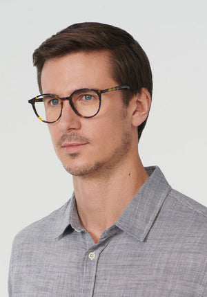 KREWE - MORRO | Lapis Handcrafted, luxury blue tortoise acetate eyeglasses mens model | Model: Tom