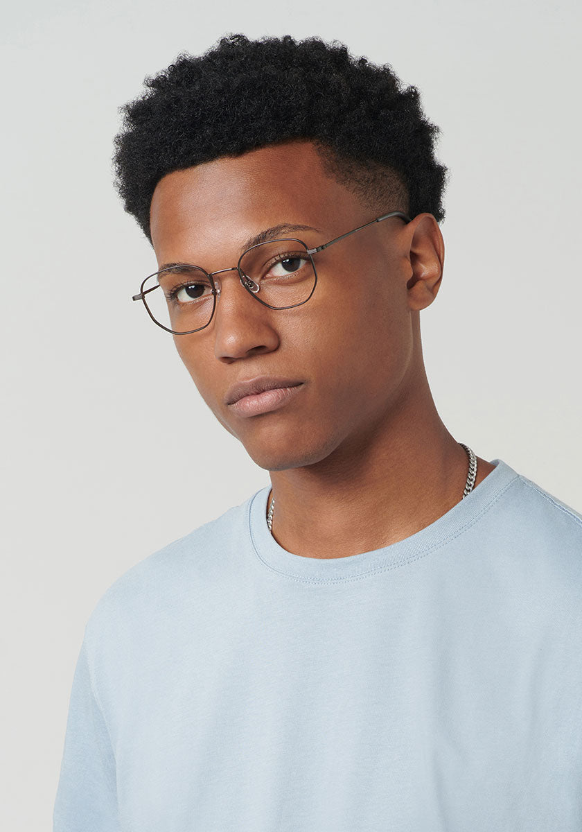 NELSON | Matte Gunmetal Handcrafted, luxury matte gunmetal KREWE glasses mens model | Model: Brandon