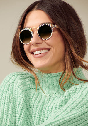 KREWE - Designer Round Sunglasses - ST. LOUIS CLASSICS | Pincheck 18K Handcrafted, luxury blue and white checkered acetate round sunglasses with a double metal bridge. A bestseller. Oliver Peoples Sunglasses, Moscot sunglasses womens model campaign | Model: Olga