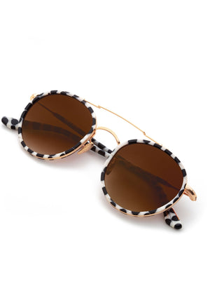 KREWE - PORTER | 24K Titanium + Matte Domino Handcrafted, luxury black and white spotted acetate round sunglasses