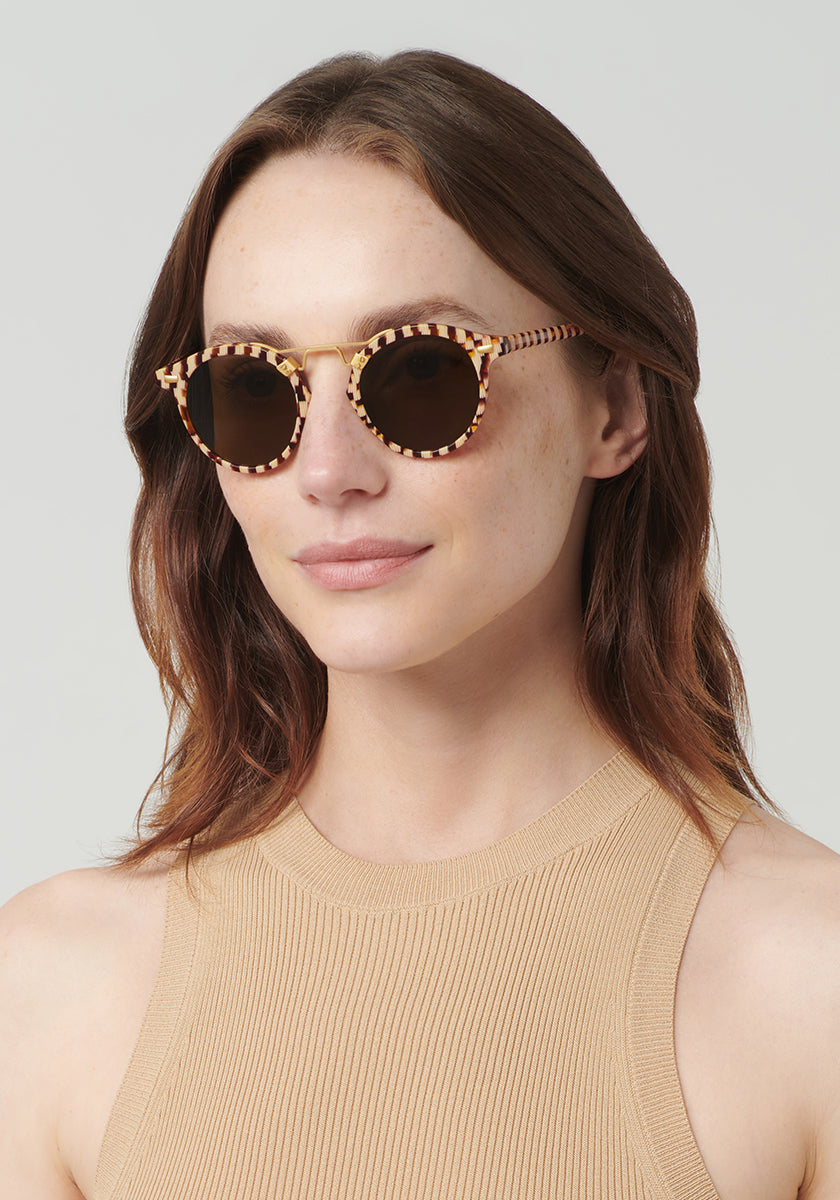 KREWE ST. LOUIS CLASSICS | Caffe Dolce 24K Handcrafted, luxury, checkered acetate KREWE sunglasses womens model | Model: Vanessa